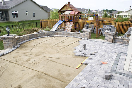 Paving patio on to leveled sand. Backyard Project..jpg